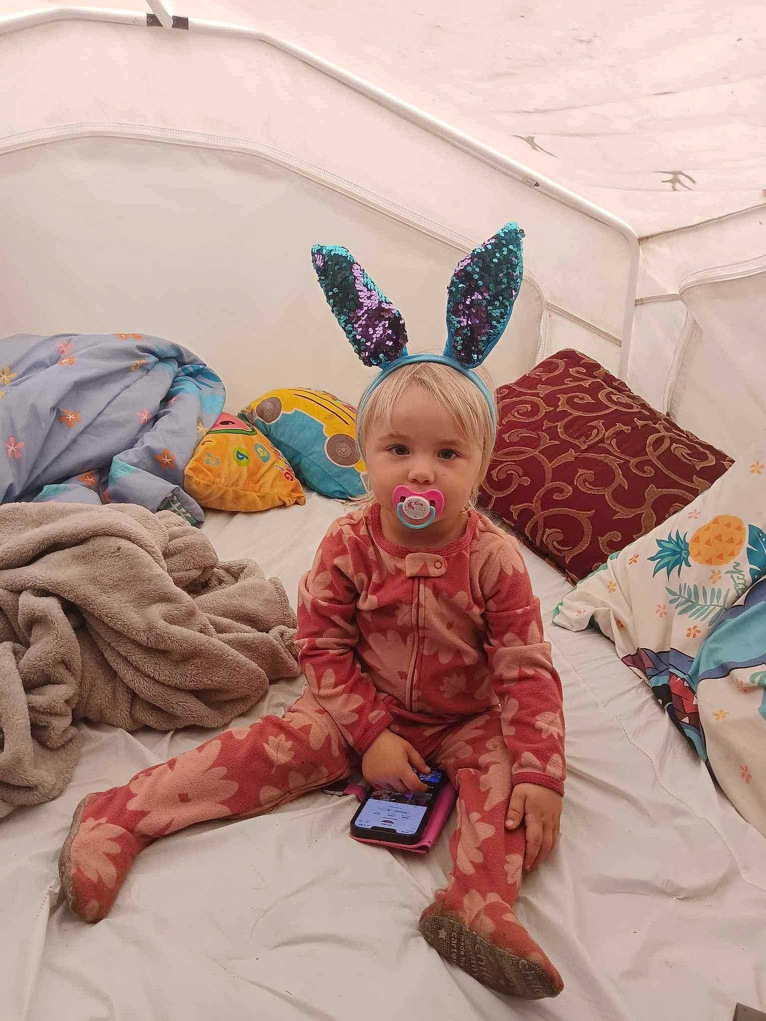 Laela joined the competition — help win amazing prizes! art, baby, bed, bed_sheet, bedding, child, comfort, couch, easter_bunny, illustration, linens, magenta, pattern, person, pillow, pink, room, sitting, stuffed_toy, textile