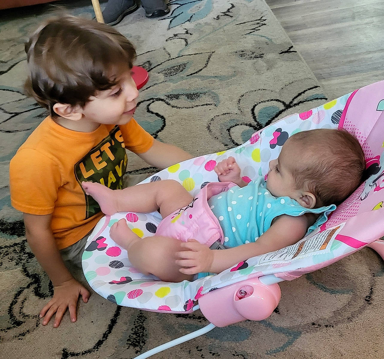 Dustin joined the competition — help win amazing prizes! arm, baby, baby_toddler_clothing, cheek, comfort, facial_expression, finger, fun, hairstyle, hand, human, joint, lap, mammal, organ, person, pink, sharing, skin, toddler