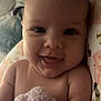 Ivy Mae joined the competition — help win amazing prizes! baby, smiling, infant, plush_toy, hand, pink_nails, closeup, face, skin, cheeks, eyes, happy, cuddle, soft_toy, floral_background, person, child, cute, indoors, portrait