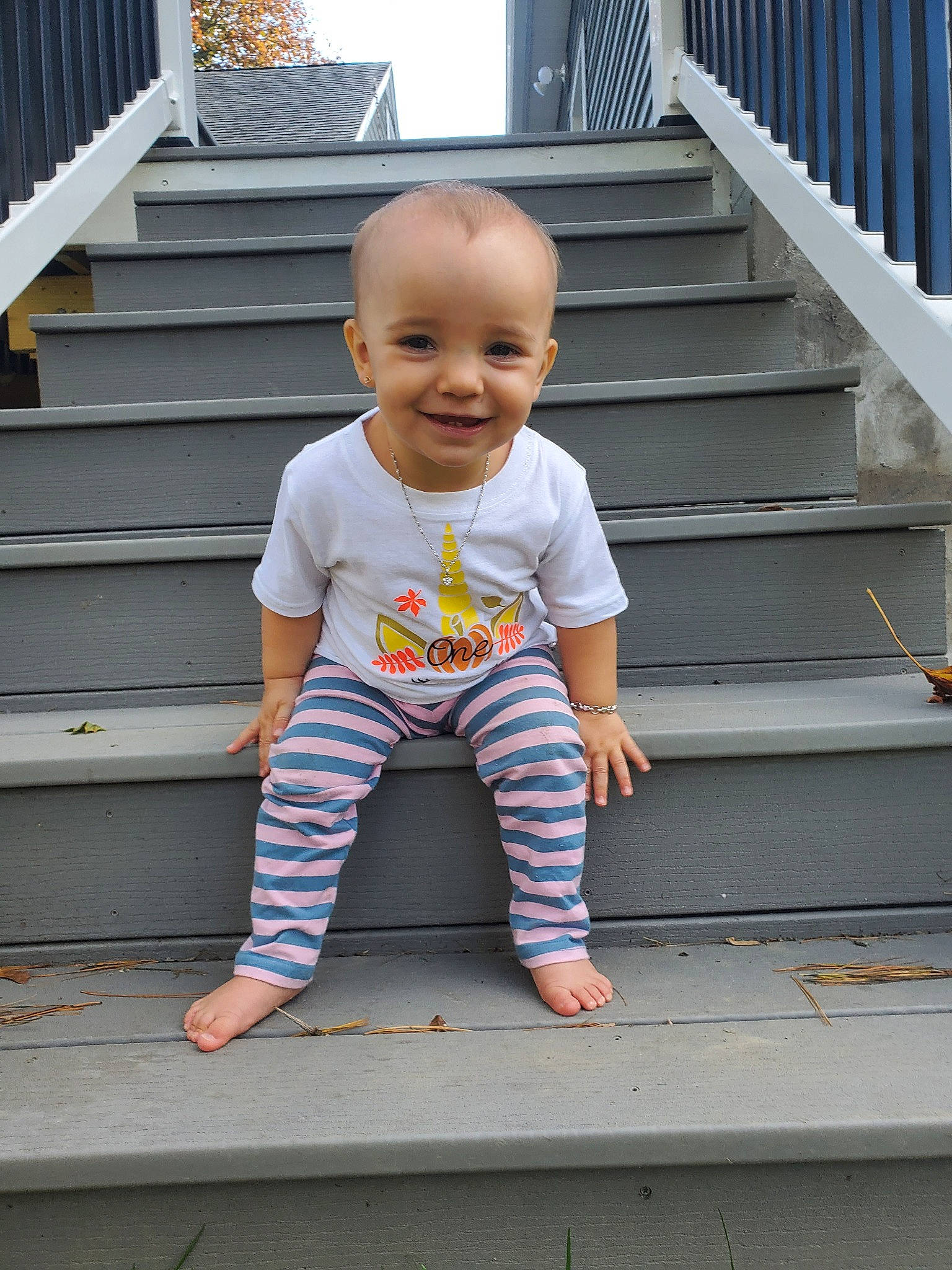 Averi joined the competition — help win amazing prizes! baby, baby_toddler_clothing, child, deck, joy, person, sitting, standing, t_shirt, toddler