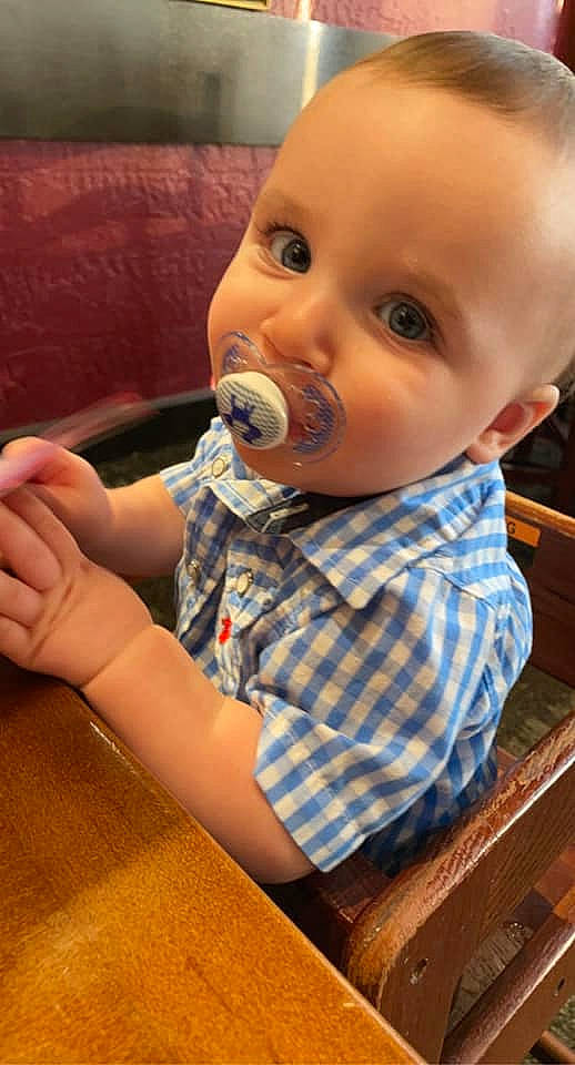 Everett is registered to the contest to win money with this photo: baby, baby_products, baby_toddler_clothing, cheek, child, comfort, eyelash, finger, flooring, fun, hand, iris, mouth, nose, person, room, sitting, skin, thumb, toddler