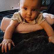 Hania is registered to the contest to win money with this photo: baby, infant, face, hands, pillow, blanket, indoor, child, cute, soft, reaching, curious, young, person, skin, clothing, bed, resting, toddler, portrait