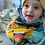 Addilyn joined the competition — help win amazing prizes! toddler, child, towel, hooded_towel, colorful, face, eyes, smile, indoor, bedroom, blanket, soft, cute, wrapped, person, young_child, portrait, expression, warm, cozy