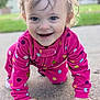 Addilyn joined the competition — help win amazing prizes! toddler, child, crawling, pink_clothing, polka_dots, smiling, happy, outdoor, concrete, curly_hair, face, hands, grass, daylight, portrait, cute, playful, young_child, casual_wear, closeup