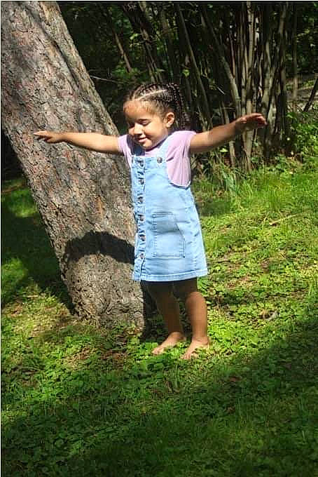 Kataryna joined the competition — help win amazing prizes! flash_photography, forest, fun, grass, grass_family, happy, joy, landscape, leisure, natural_environment, people_in_nature, person, plant, shorts, smile, t_shirt, terrestrial_plant, toddler, tree, trunk