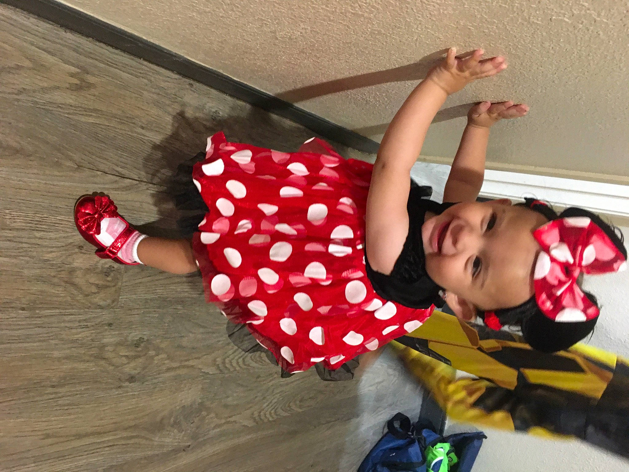 Maya joined the competition — help win amazing prizes! baby, baby_toddler_clothing, child, flooring, fun, happy, hardwood, headwear, human_leg, joint, joy, knee, leg, leisure, pattern, person, play, sandal, smile, thigh