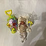 baby, bed, blanket, brown, child, cozy, cute, gift_bag, hat, infant, newborn, pajamas, plastic_wrap, polka_dot, rest, sleeping, soft, toy, white, yellow