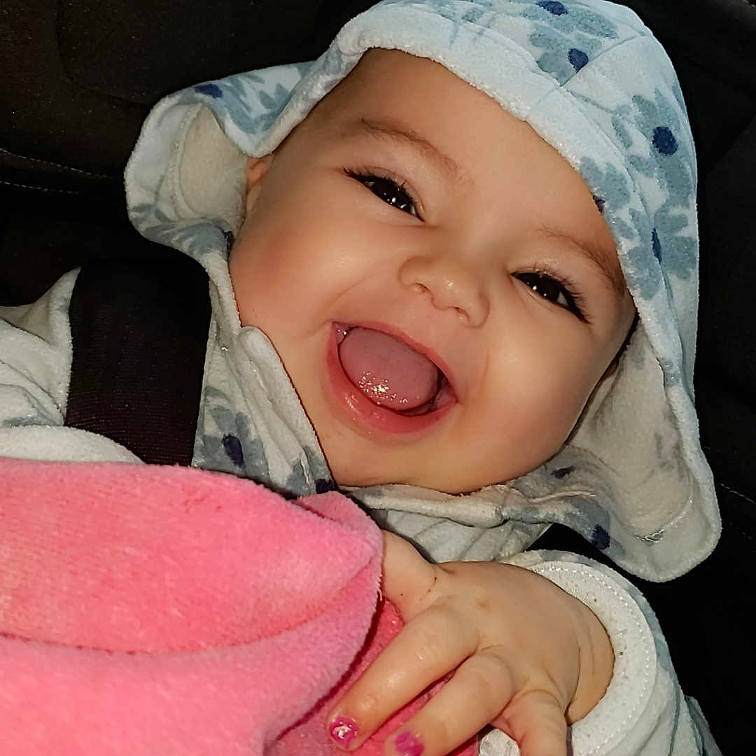 Xaia Jayne joined the competition — help win amazing prizes! baby, babylaughing, bodypart, bonnet, cap, clothing, coat, face, finger, hand, happy, hat, head, hood, hoodie, jacket, person, photography, portrait, smile