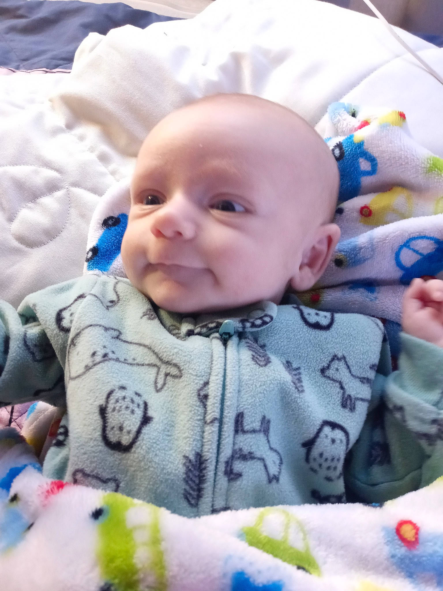 Legend is registered to the contest to win money with this photo: baby, baby_toddler_clothing, beauty, cheek, child, comfort, face, facial_expression, grass, happy, iris, linens, people, person, product, skin, sleeve, smile, textile, toddler