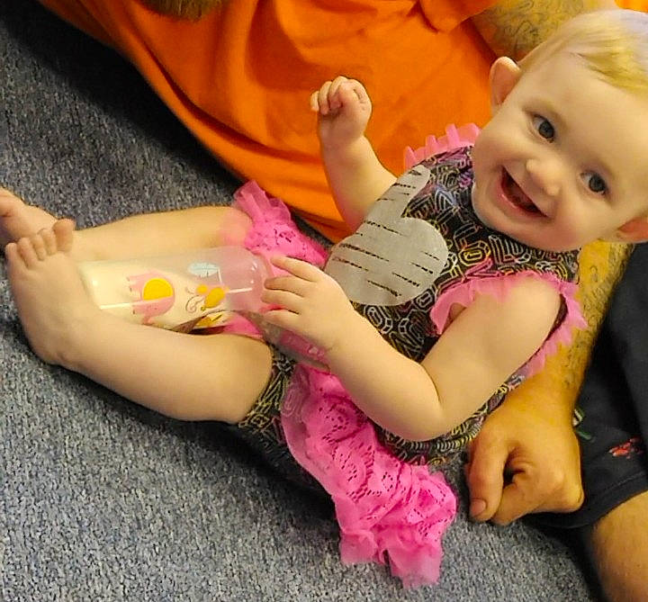 Heaven joined the competition — help win amazing prizes! baby_toddler_clothing, cheek, child, comfort, finger, fun, gesture, hand, happy, human_body, joy, knee, leg, nail, person, pink, skin, smile, sock, thigh