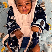 Ace joined the competition — help win amazing prizes! baby, infant, smile, face, robe, blanket, mickey_mouse, pattern, blue, white, cozy, cute, happy, socks, fist, child, lying_down, soft, warm, indoor