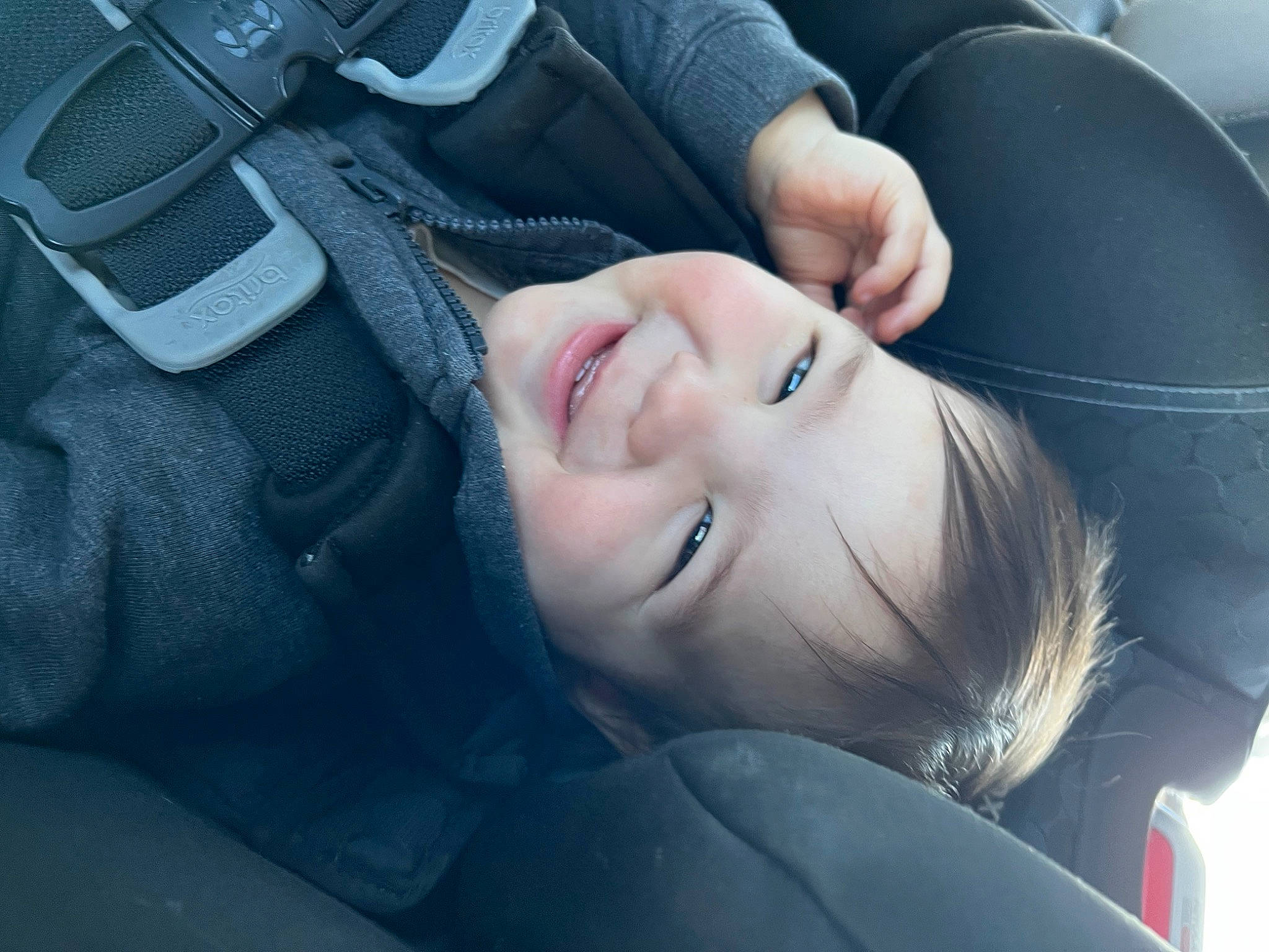 Kaiden is registered to the contest to win money with this photo: auto_part, automotive_design, black_hair, child, close_up, comfort, cool, electric_blue, eye, eyebrow, eyelash, flash_photography, grass, happy, lip, mouth, neck, person, skin, smile