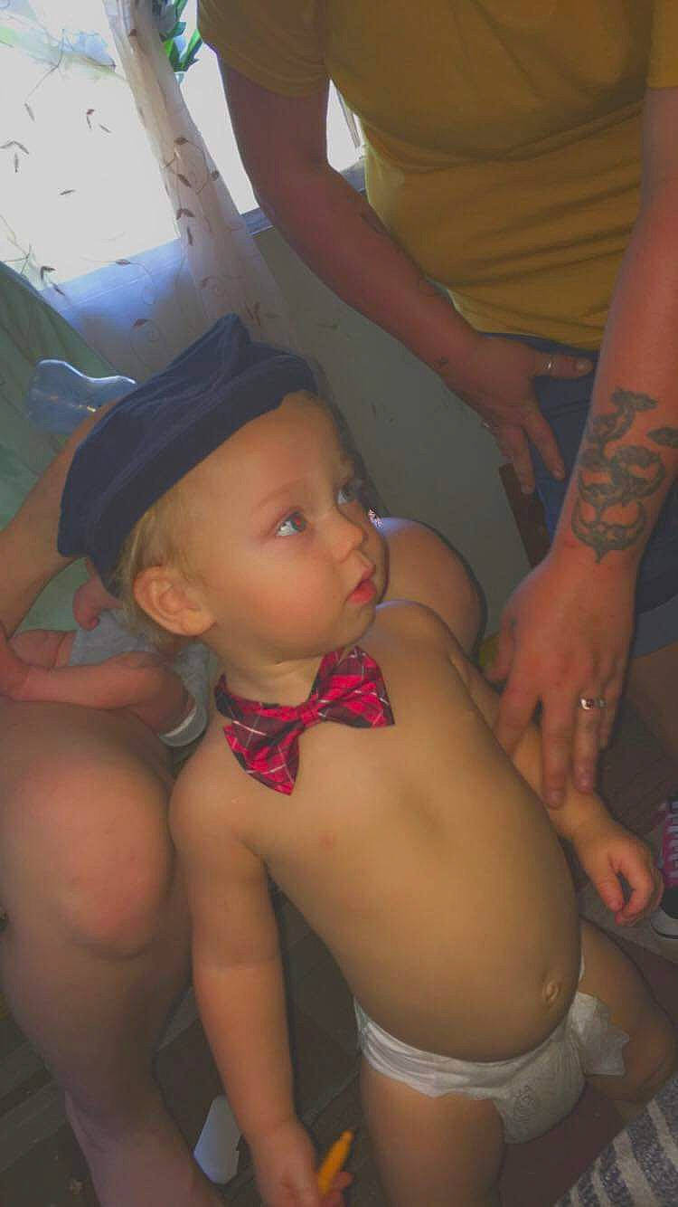 Weston is registered to the contest to win money with this photo: abdomen, bathing, chest, child, headwear, leg, mouth, neck, person, trunk