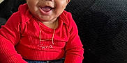 Leeonnie joined the competition — help win amazing prizes! baby, child, smiling, red_clothing, headband, flower, tutu, shoes, jeans, happy, sitting, indoors, cute, portrait, face, hand, couch, black_background, accessory, gold_necklace