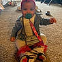 baby, child, pacifier, denim_jacket, headband, flower, sneakers, carpet, indoor, smiling, cute, purse, red, white, person, floor, happy, young_child, clothing, accessories