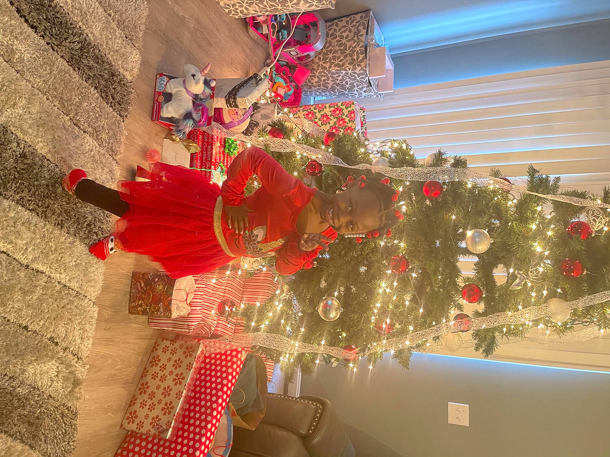 Jalayah is registered to the contest to win money with this photo: building, carmine, christmas, christmas_decoration, christmas_eve, christmas_ornament, christmas_tree, conifer, decoration, event, holiday, holiday_ornament, interior_design, joy, ornament, person, plant, red, tints_and_shades, tradition