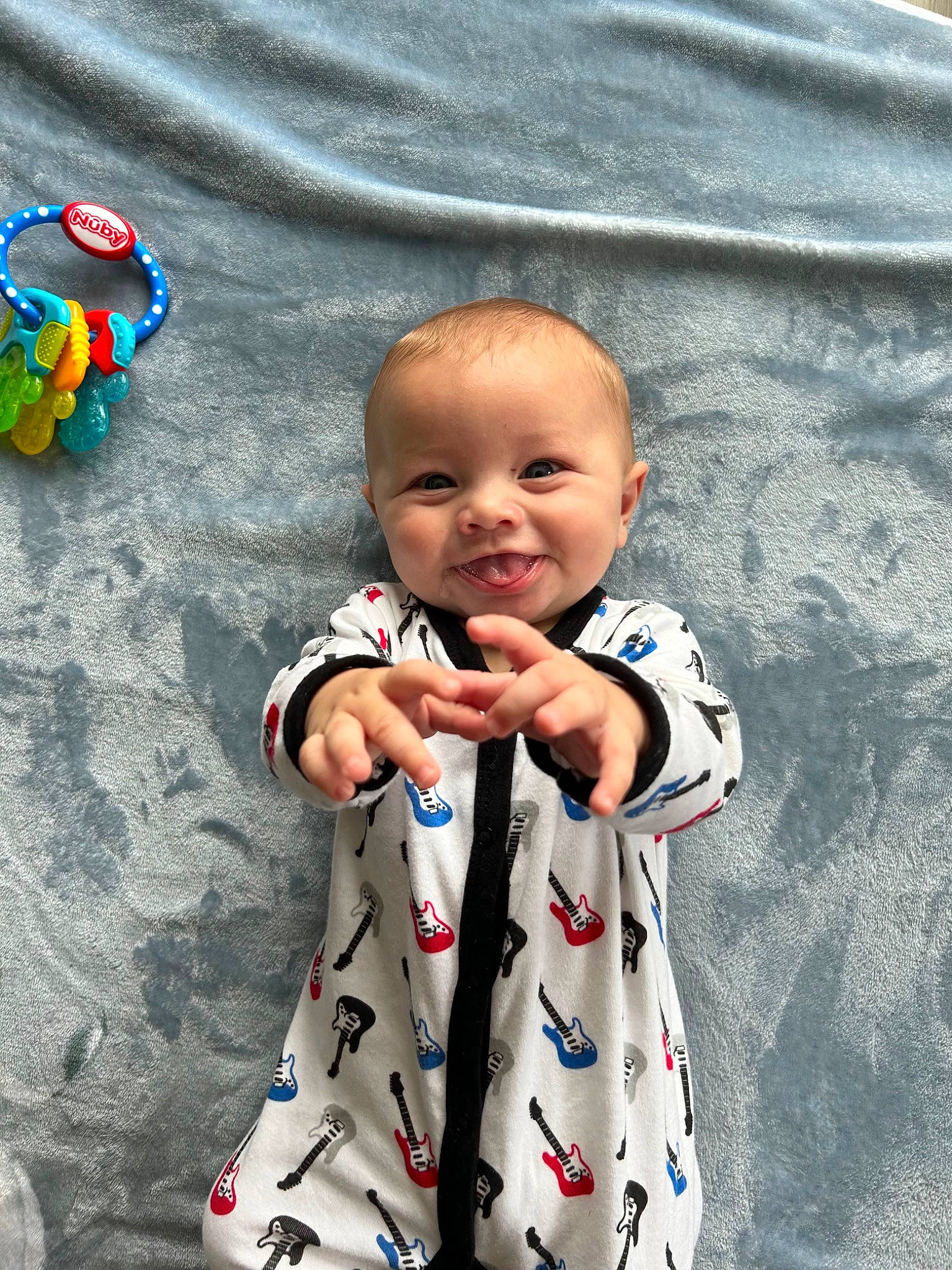 Kane is registered to the contest to win money with this photo: baby, baby_toddler_clothing, beauty, child, collar, eye, fun, gesture, hairstyle, happy, head, joy, pattern, people_in_nature, person, photograph, skin, sleeve, smile, textile