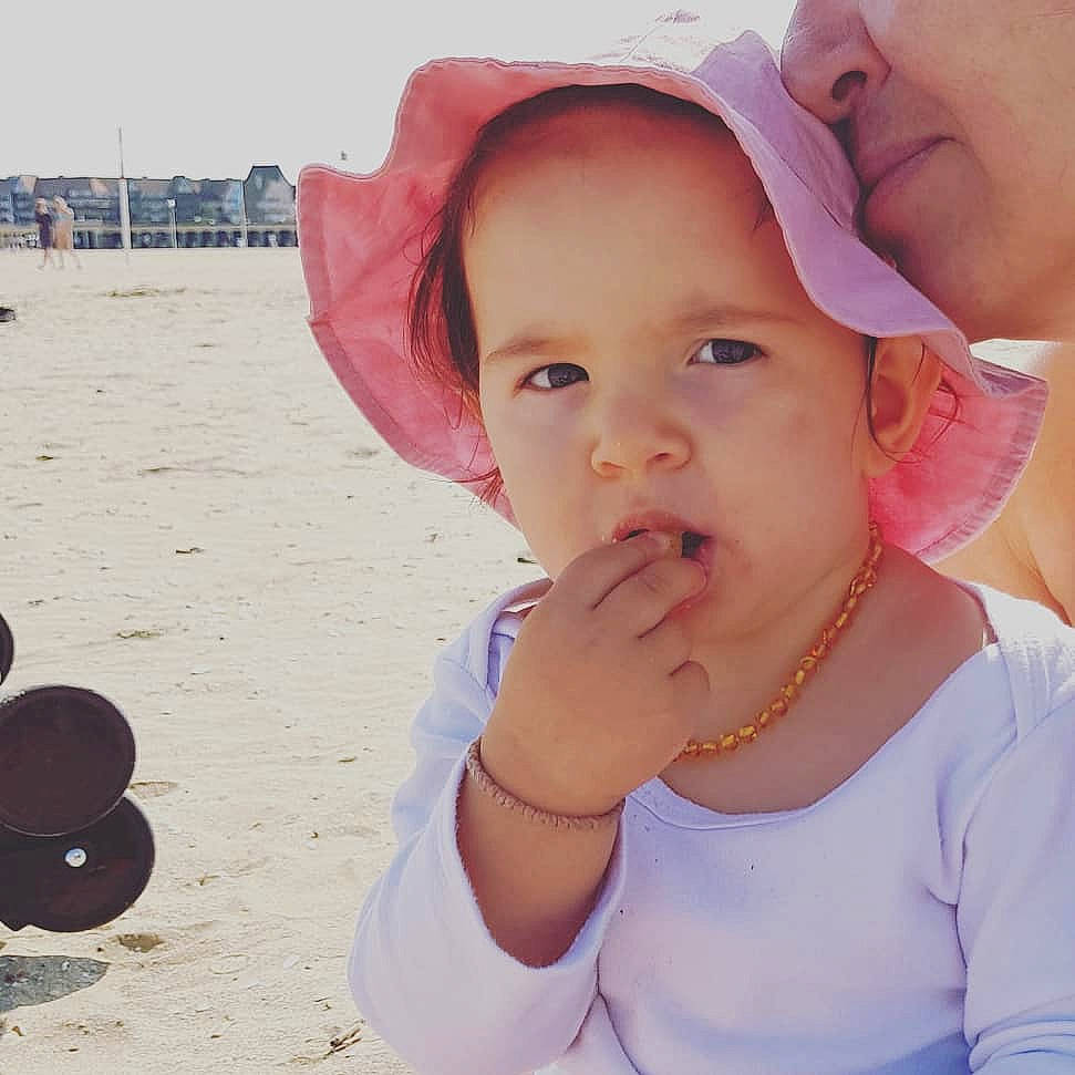 Iskra participe au concours pour gagner de l'argent avec cette photo : cheek, child, ear, fun, girl, happiness, headgear, infant, lip, mouth, nose, person, pink, product, skin, smile, sun_hat, toddler, vacation