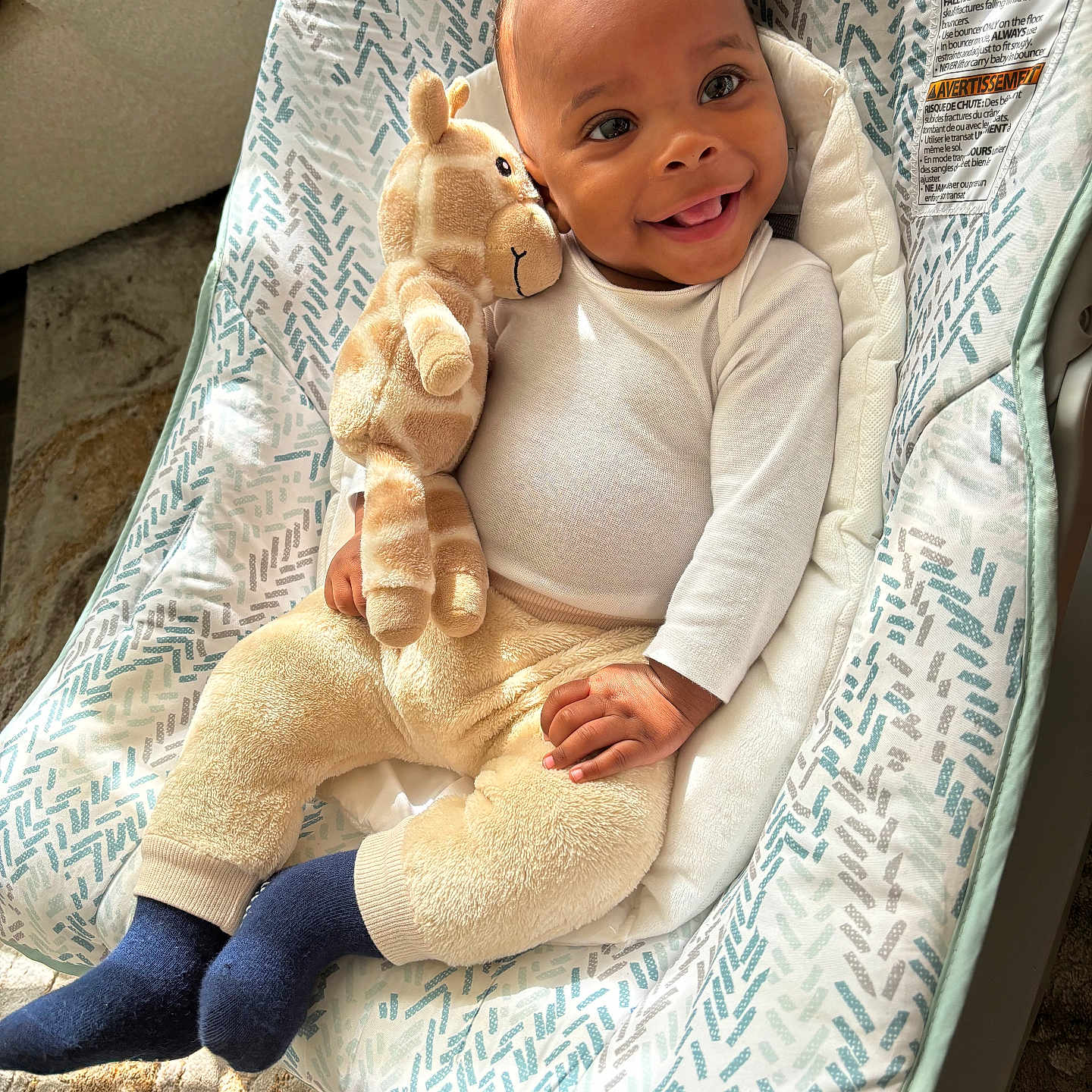 Benjamin joined the competition — help win amazing prizes! baby, blanket, clothing, crib, face, furniture, happy, head, hosiery, infantbed, pants, person, photography, portrait, sitting, smile, sock, teddybear, toy