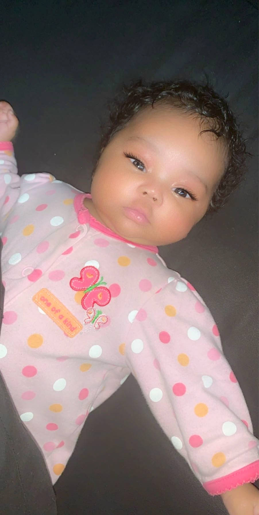 Honesty is registered to the contest to win money with this photo: baby, baby_toddler_clothing, cheek, child, pattern, person, pink, polka_dot, skin, toddler