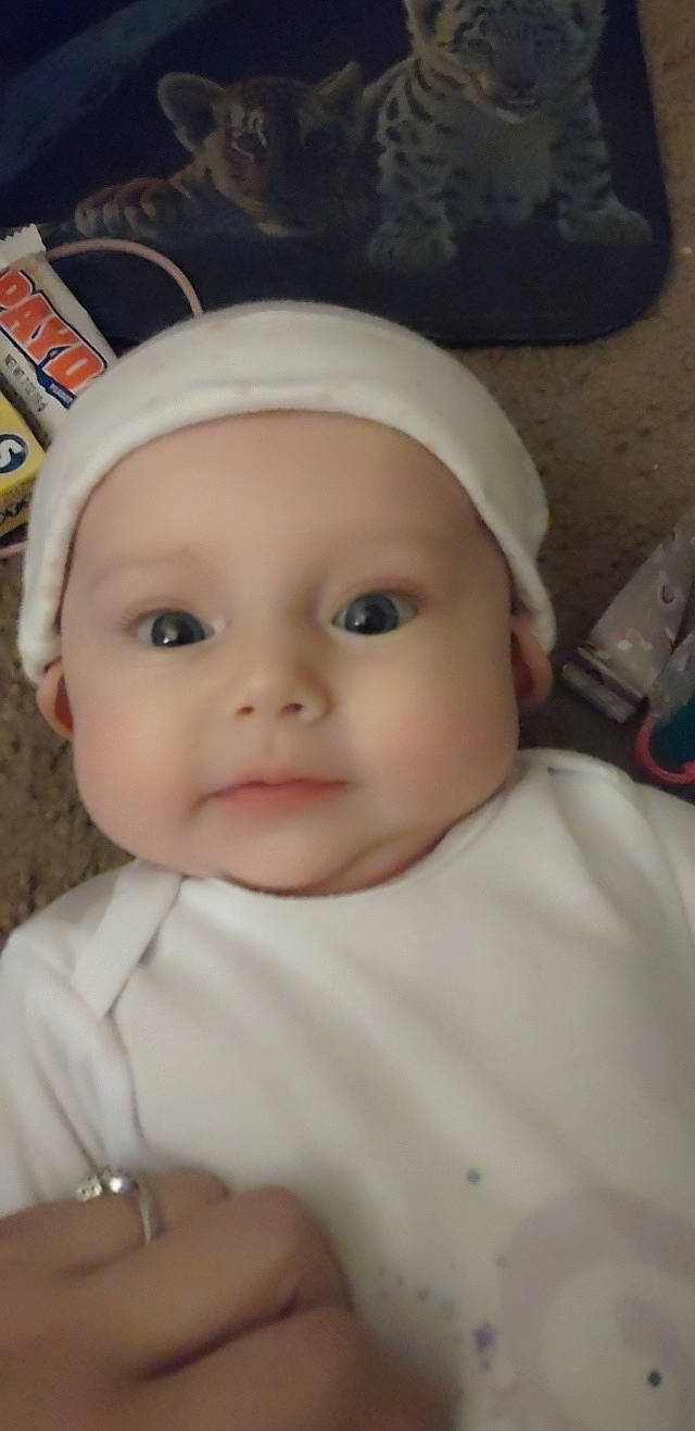 Esme is registered to the contest to win money with this photo: baby, baby_toddler_clothing, cap, cheek, child, comfort, eye, eyebrow, eyelash, fashion_accessory, forehead, hat, headgear, headwear, helmet, iris, lip, mouth, nose, person