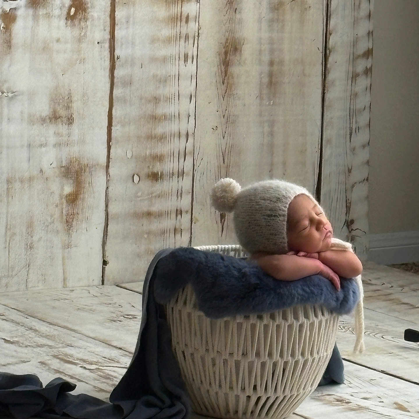 Adiel joined the competition — help win amazing prizes! baby, basket, blanket, child, cozy, cute, hat, indoors, infant, knitted, newborn, peaceful, pom_pom, portrait, resting, sleeping, soft, warm, wooden_floor, wooden_wall