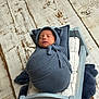 Adiel joined the competition — help win amazing prizes! baby, newborn, swaddled, sleeping, blue_clothing, knit, bed, wooden_bed, pillow, blanket, floor, wooden_floor, cozy, cute, infant, sleep, indoors, child, peaceful, portrait