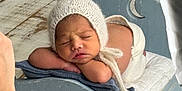Adiel is registered to the contest to win money with this photo: baby, newborn, sleeping, hat, bonnet, bed, wooden_bed, blue, blanket, pillow, infant, sleep, cute, rest, child, photography, studio, soft, peaceful, portrait