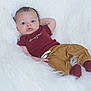 Jasiah is registered to the contest to win money with this photo: baby, infant, child, maroon_shirt, brown_pants, socks, fluffy_background, soft_texture, portrait, cute, relaxed, indoor, fashion, clothing, person, skin, face, eyes, mouth, hand