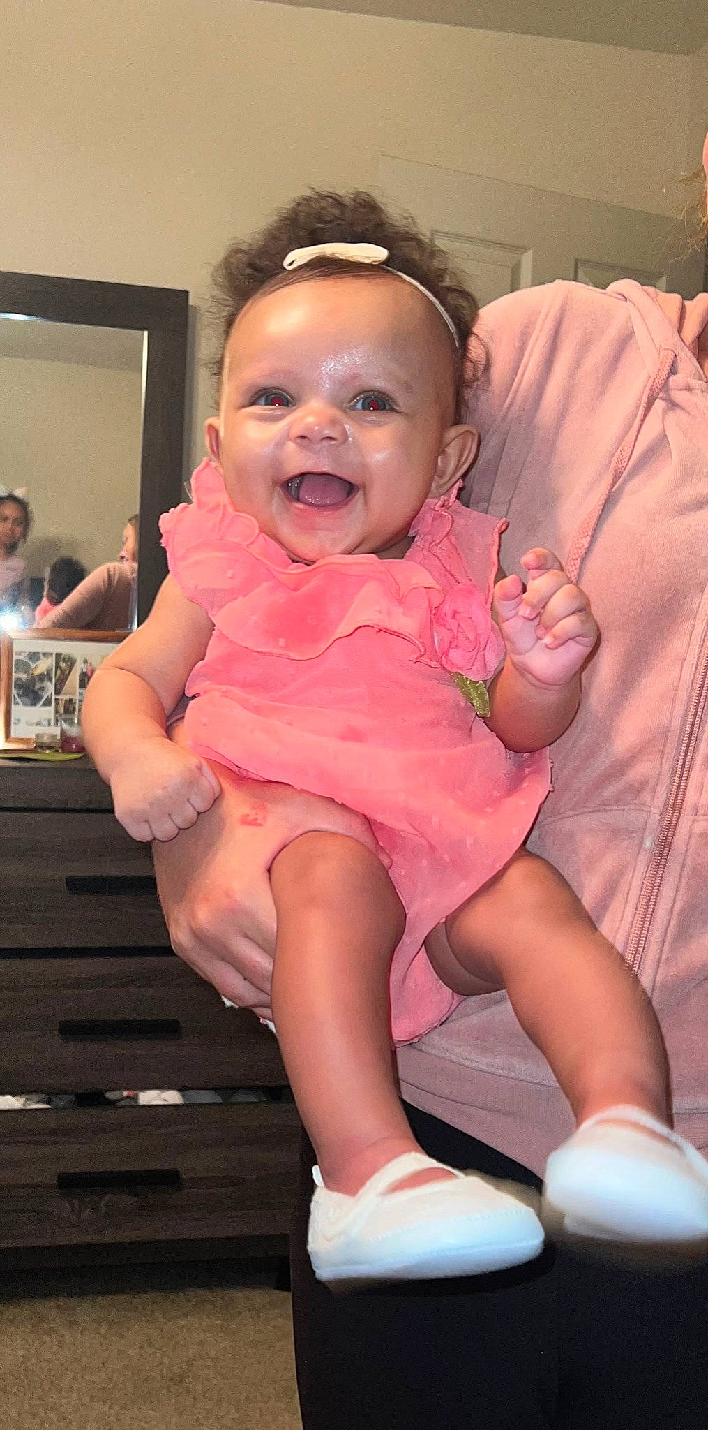 Heavenly Mae joined the competition — help win amazing prizes! baby, baby_toddler_clothing, cheek, child, dress, facial_expression, finger, fun, gesture, happy, human_leg, leg, person, pink, sitting, skin, smile, sock, thigh, thumb