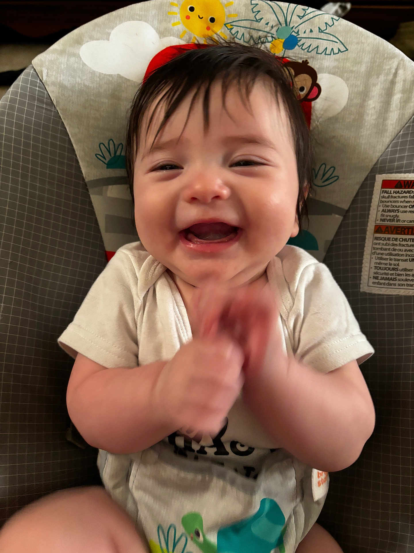 Shane joined the competition — help win amazing prizes! baby, smiling, happy, infant, clapping, baby_seat, cute, child, indoor, clothing, face, person, joy, cheerful, young, seat, playful, animal_print, sun_illustration, monkey_illustration