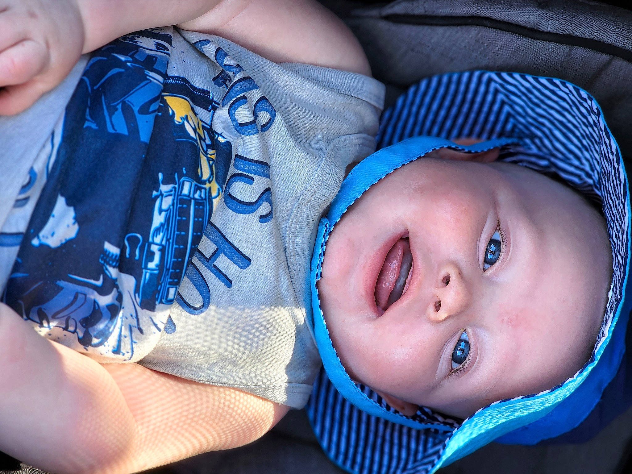 Rowan joined the competition — help win amazing prizes! azure, baby, baby_toddler_clothing, blue, cheek, comfort, cool, eye, eyelash, finger, headgear, headwear, human_body, iris, mouth, muscle, organ, person, skin, textile