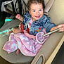 Azari joined the competition — help win amazing prizes! baby, clothing, coat, dress, face, furniture, hair, happy, head, jacket, jeans, pants, person, photography, portrait, shorts, sitting, smile, transportation, vehicle
