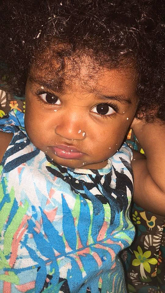 Janiya is registered to the contest to win money with this photo: black_hair, boy, cheek, child, eye, face, forehead, fun, girl, head, human, infant, iris, lip, nose, organ, person, skin, smile, temple