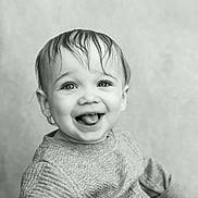 Zander joined the competition — help win amazing prizes! toddler, child, smiling, portrait, black_and_white, happy, baby, face, wet_hair, sweater, cute, young_child, expression, indoors, closeup, person, head_and_shoulders, joyful, tongue_out, monochrome