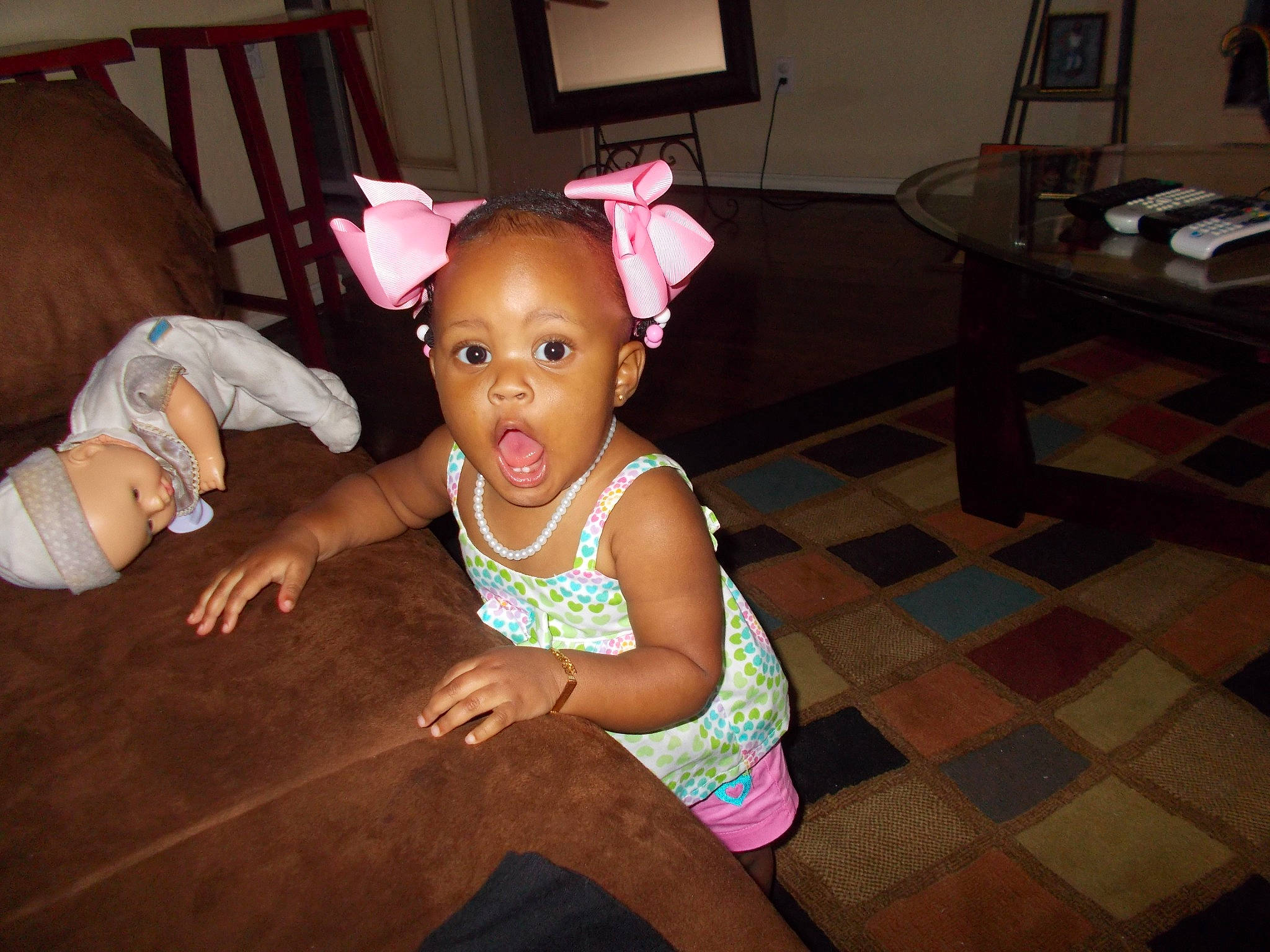 Jacey joined the competition — help win amazing prizes! baby, baby_toddler_clothing, chair, clothing, event, face, facial_expression, flash_photography, floor, flooring, hairstyle, happy, iris, leisure, magenta, person, pink, purple, sitting, skin