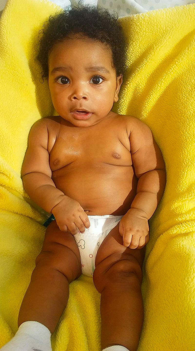Mason joined the competition — help win amazing prizes! abdomen, black_hair, cheek, chest, child, child_model, finger, girl, infant, leg, mouth, muscle, person, skin, thigh, toddler, trunk, yellow