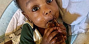Jaleil joined the competition — help win amazing prizes! baby, bone, child, closeup, clothing, curly_hair, cushion, cute, eating, face, feeding, food, hands, highchair, indoor, infant, meat, messy, person, seat