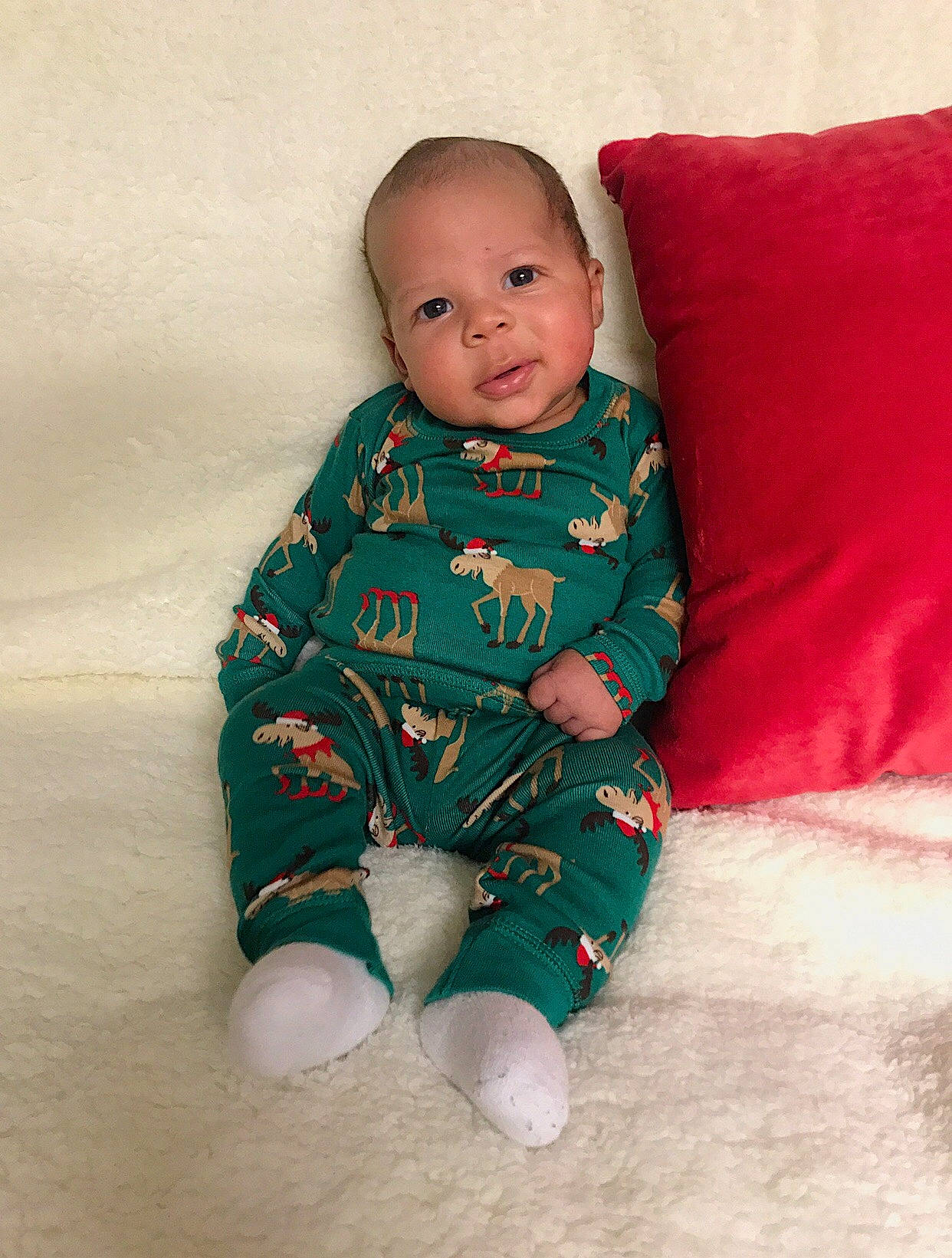 Gionni is registered to the contest to win money with this photo: baby, baby_toddler_clothing, child, head, person, sitting, skin, sleeve, toddler