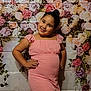 Sarah is registered to the contest to win money with this photo: child, clothing, dress, face, fashion, female, flower, flowerarrangement, flowerbouquet, formalwear, girl, happy, head, person, petal, photography, plant, portrait, rose, smile