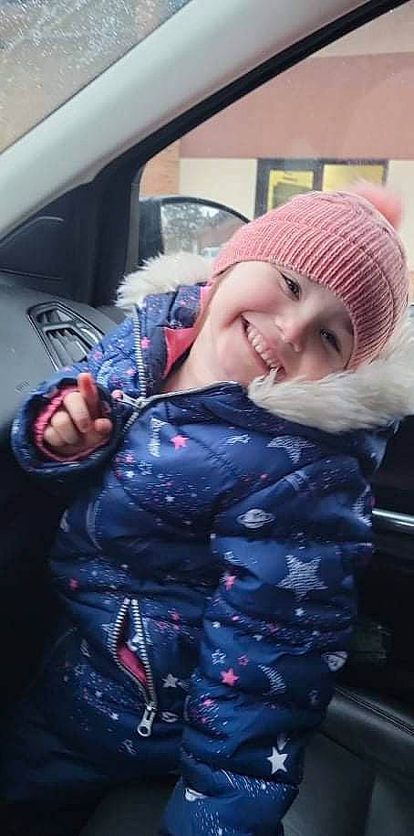 Gabbriella is registered to the contest to win money with this photo: auto_part, automotive_design, automotive_exterior, automotive_lighting, beauty, cap, car, electric_blue, fun, happy, headgear, headwear, joy, knit_cap, lip, motor_vehicle, outerwear, person, smile, street_fashion