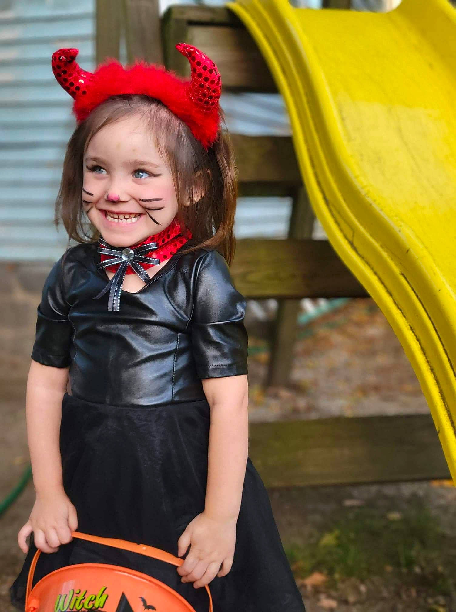 Gabbriella joined the competition — help win amazing prizes! child, event, facial_expression, fashion, formal_wear, fun, grass, green, hairstyle, happy, headband, jewellery, joy, orange, organ, pattern, people_in_nature, person, recreation, red