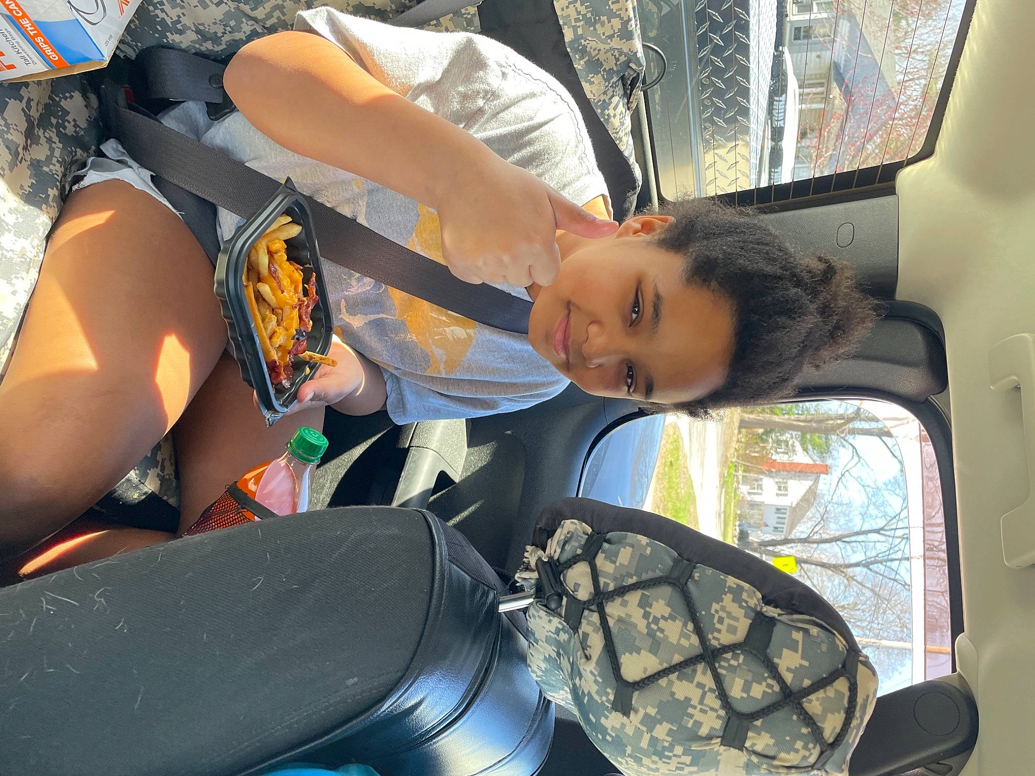 Stormee is registered to the contest to win money with this photo: auto_part, automotive_design, automotive_exterior, automotive_lighting, automotive_mirror, automotive_window_part, car, car_seat, eyewear, family_car, fun, human_leg, joy, mirror, motor_vehicle, person, rear_view_mirror, thigh, vehicle, vehicle_door