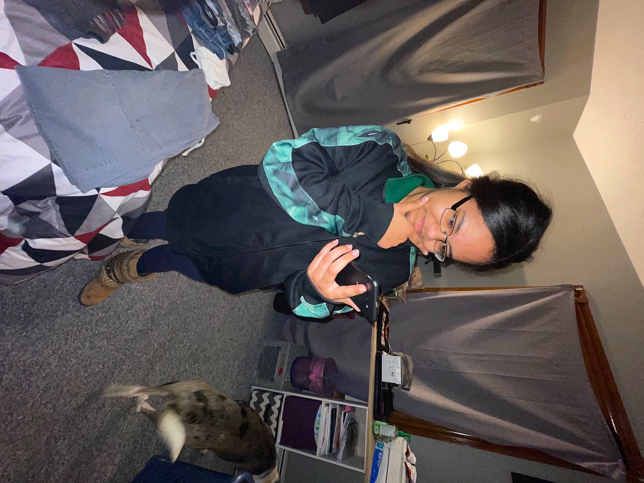 Savanna Perkins is registered to the contest to win money with this photo: cool, event, eyewear, fun, glasses, joy, luxury_vehicle, microphone, person, recreation, room, sneakers, vehicle_door