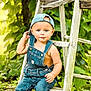 Lex joined the competition — help win amazing prizes! toddler, child, denim_overalls, cap, barefoot, wooden_ladder, outdoor, greenery, foliage, grass, nature, cute, portrait, summer, casual_clothing, baby, sitting, curious, blue_eyes, sunlight