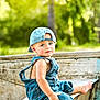 Lex joined the competition — help win amazing prizes! toddler, child, denim_cap, denim_overalls, barefoot, outdoor, wooden_bench, greenery, forest, sunlight, portrait, curious, baby, sitting, casual, nature, summer, cute, young_child, daylight