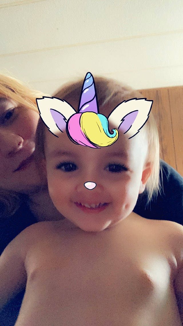 Ella is registered to the contest to win money with this photo: arm, cheek, ear, eye, eyebrow, finger, gesture, hair, hand, happy, head, headwear, human_body, iris, joy, mouth, neck, person, pink, purple