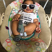 Josiah Navarro is registered to the contest to win money with this photo: baby, bean_bag, child, cool, eyewear, fun, furniture, glasses, photography, sunglasses, toddler, vacation