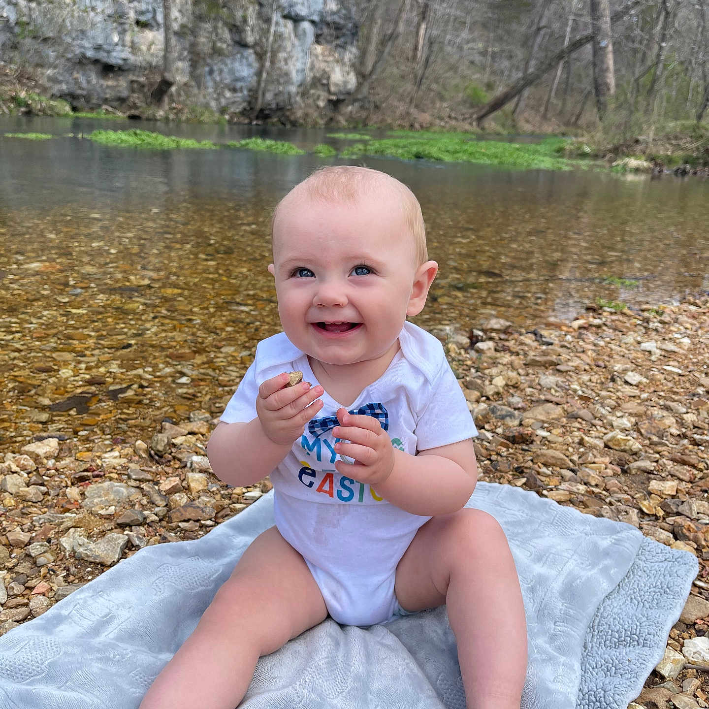 Rhett joined the competition — help win amazing prizes! baby, clothing, face, grass, head, land, nature, outdoors, person, photography, plant, portrait, rock, sitting, soil, summer, tree, vegetation, wilderness, woodland