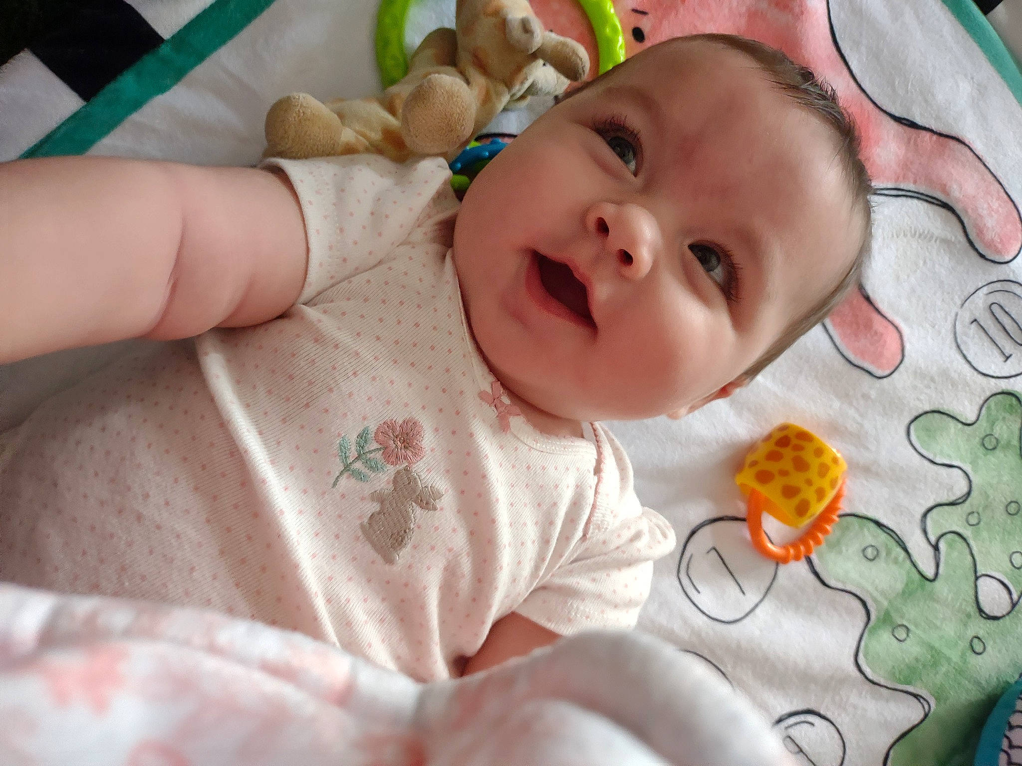 Hazel joined the competition — help win amazing prizes! baby, baby_products, baby_safety, baby_toddler_clothing, cheek, child, close_up, comfort, eye, finger, happy, iris, linens, mouth, nose, pattern, person, skin, smile, textile